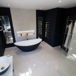 1. A beautiful large master en-suite. Painted in Farrow & Ball Hague Blue. Tiled in Minoli Moon Onyx.