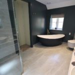 10. This master en-suite has it all. Breeze bath from Waters Baths of Ashbourne, painted in Farrow & Ball Hague Blue.