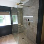 14. Brushed brass shower from JTP. Shower glass and fittings from Kudos.