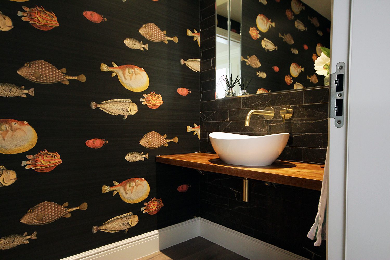 Cloakroom with wallpaper