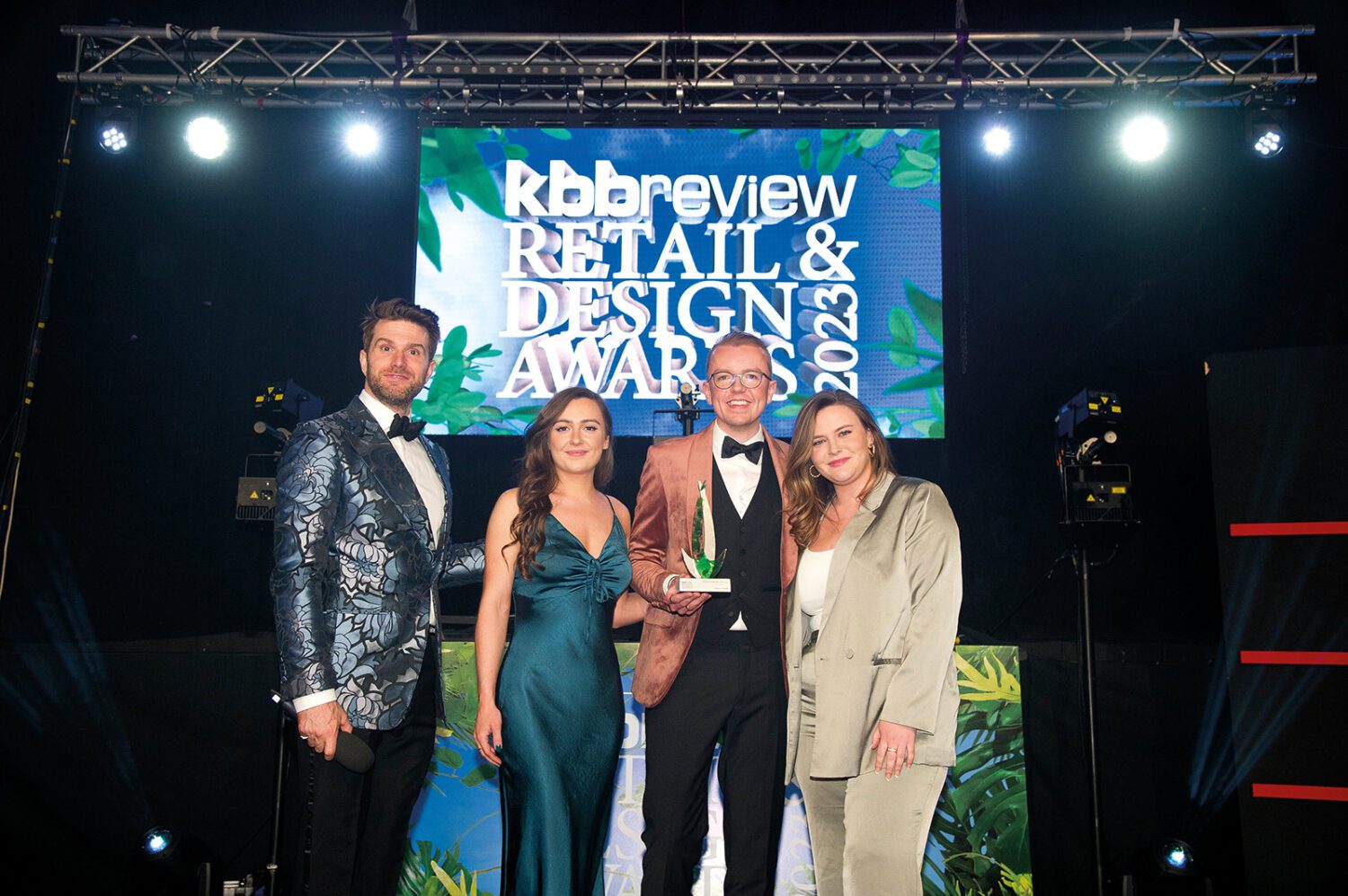 Shane and Natalie collecting the bathroom showroom of the year trophy.