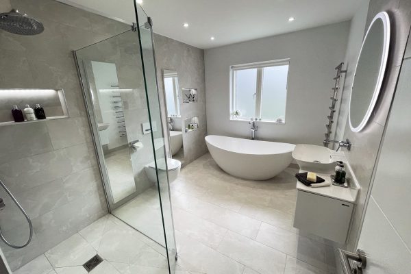 1. Light and bright. A large family bathroom tiled with Moon Onyx tiles from Minoli.