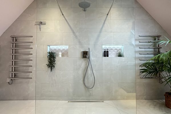 Large double entry walk in shower is the main feature in this spacious family bathroom.